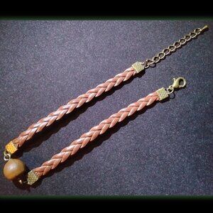 Braided leather bracelet with willow oak nut